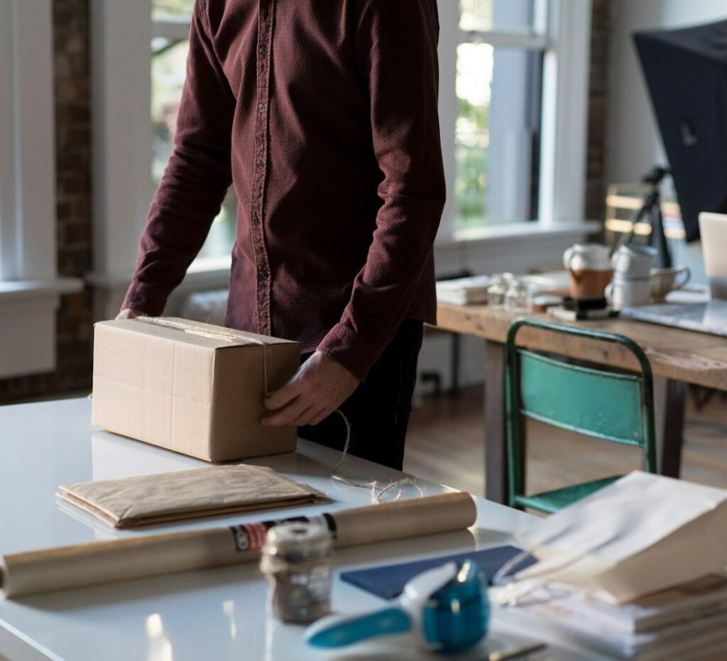 Store owner packing an online order